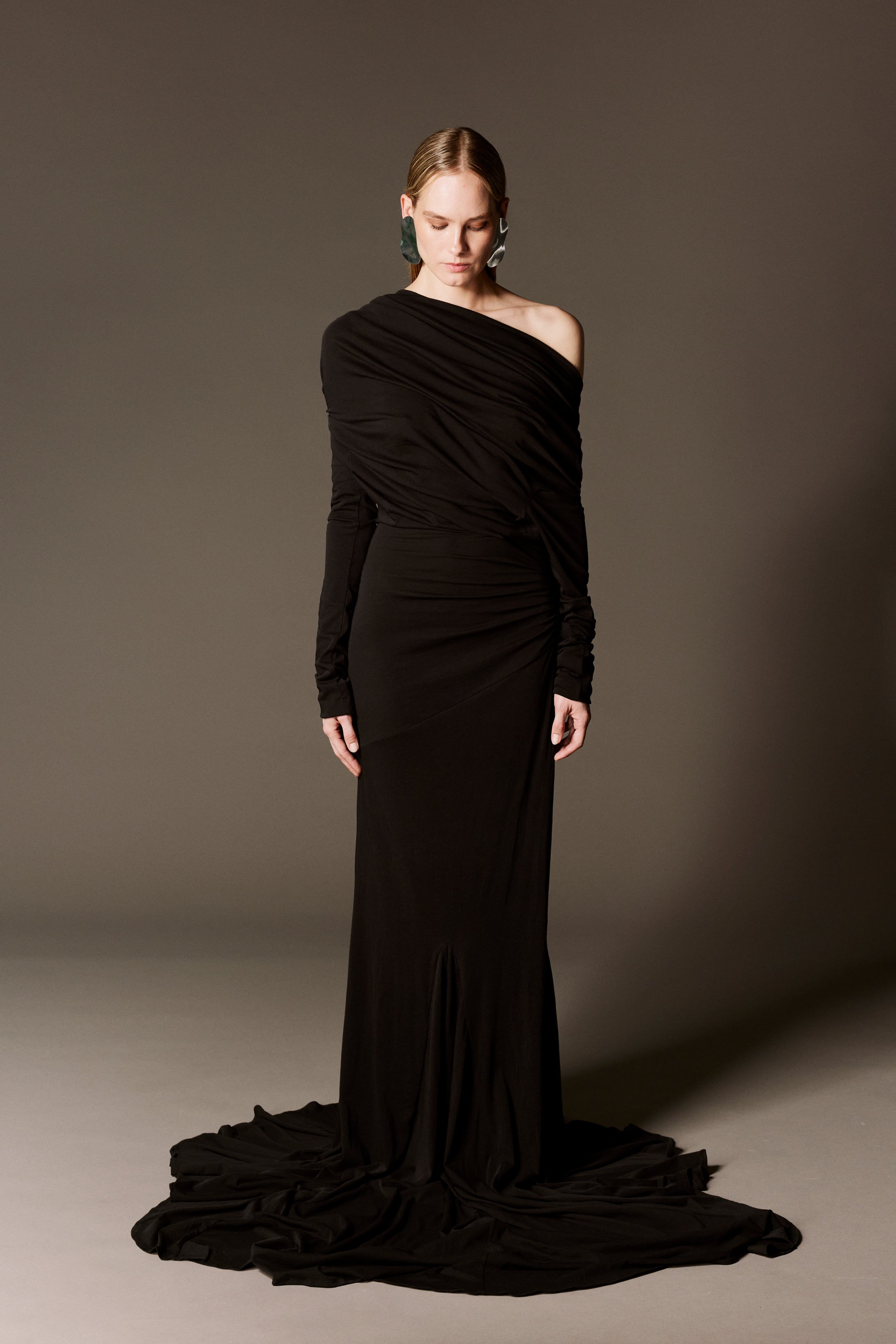 off-shoulder draped gown